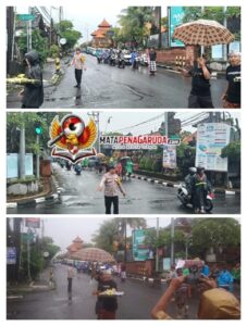 Pastikan Prosesi Ngaben Berjalan Lancar, Bhabinkamtibmas Kesiman Petilan dan Pecalang Lakukan Pengamanan