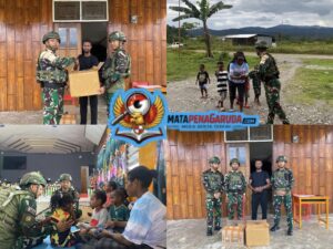 Tebar Kasih di Tanah Papua, Satgas Yonif 521/DY Berbagi Alkitab di Gereja GBI Shekinah