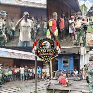 Satgas Yonif 123/Rajawali Bagikan Bantuan Pangan kepada Warga Kampung Binam